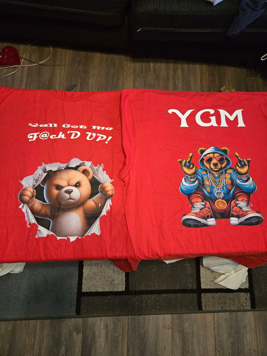 Red YGM shirt, blue bear, white font.